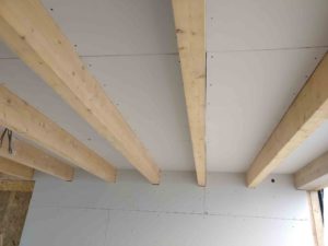 Gluelam beams installed and boarded between