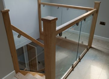 Oak stairs with glass installed